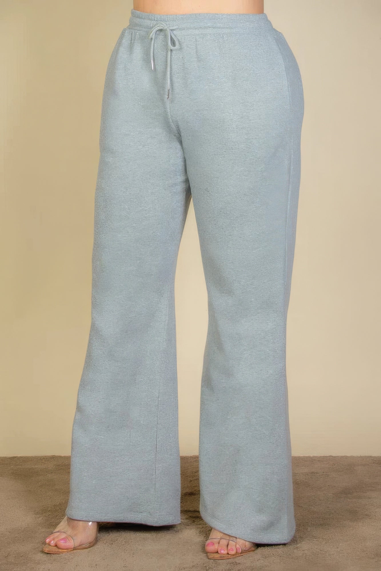 Pantalones deportivos con bolsillos inclinados y cintura con cordón ajustable de talla grande