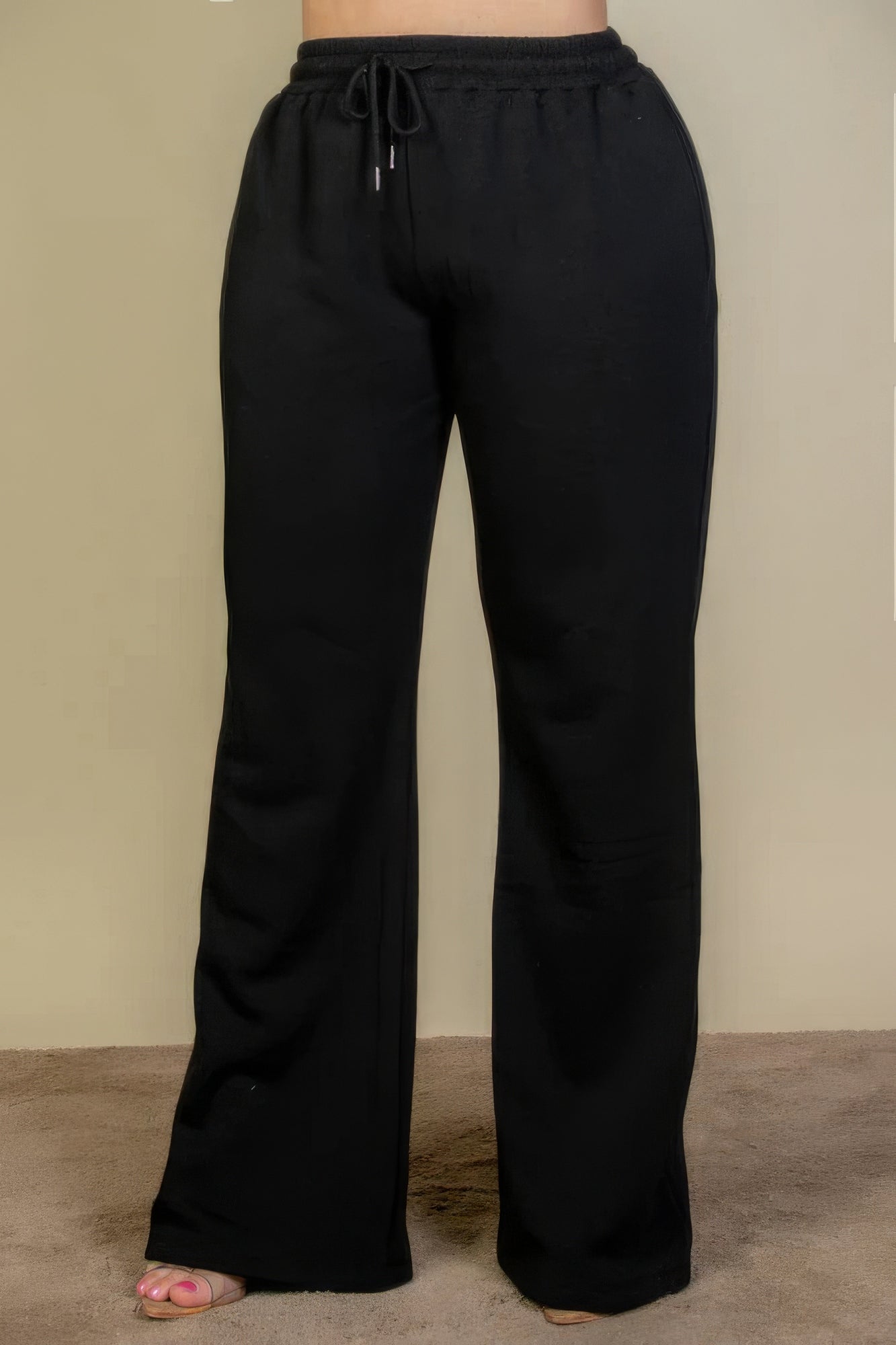 Pantalones deportivos con bolsillos inclinados y cintura con cordón ajustable de talla grande