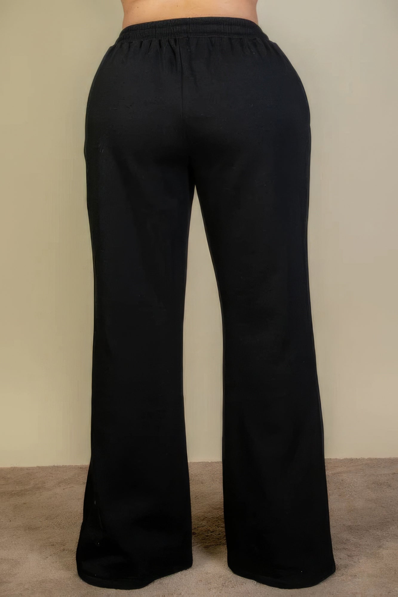 Pantalones deportivos con bolsillos inclinados y cintura con cordón ajustable de talla grande