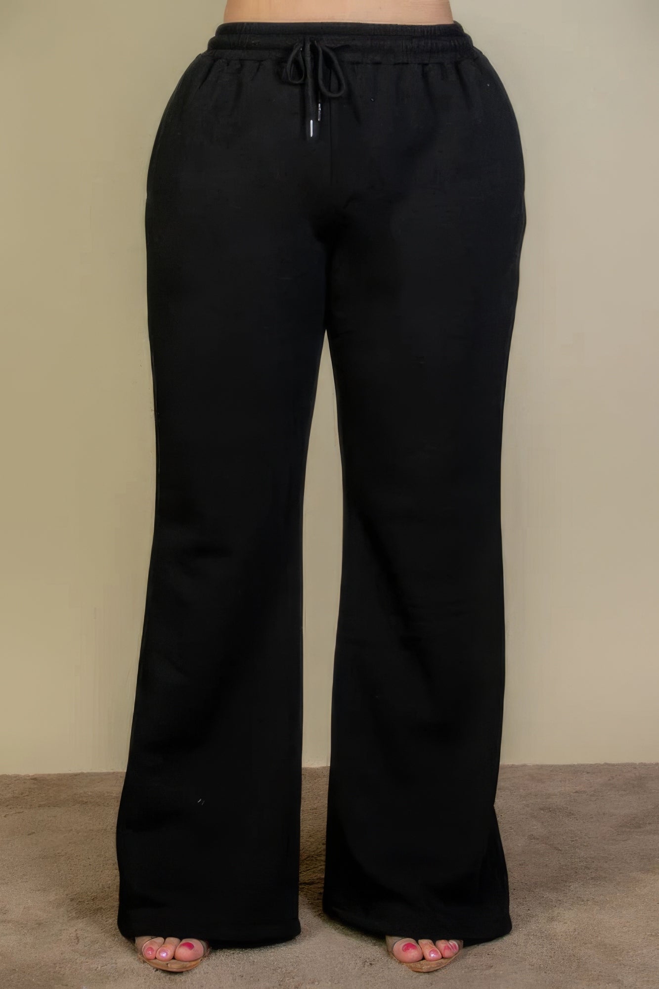 Pantalones deportivos con bolsillos inclinados y cintura con cordón ajustable de talla grande