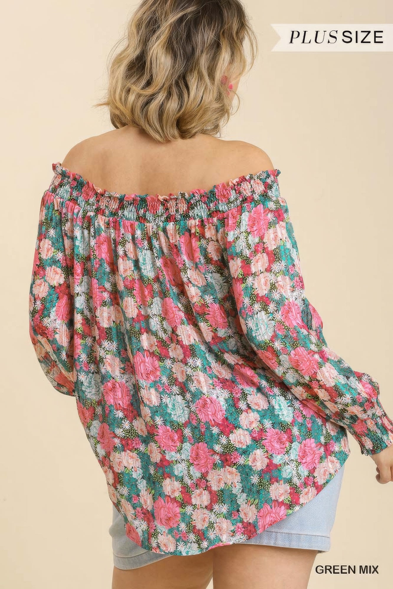 Blusa de manga larga con hombros descubiertos, dobladillo asimétrico y estampado floral transparente