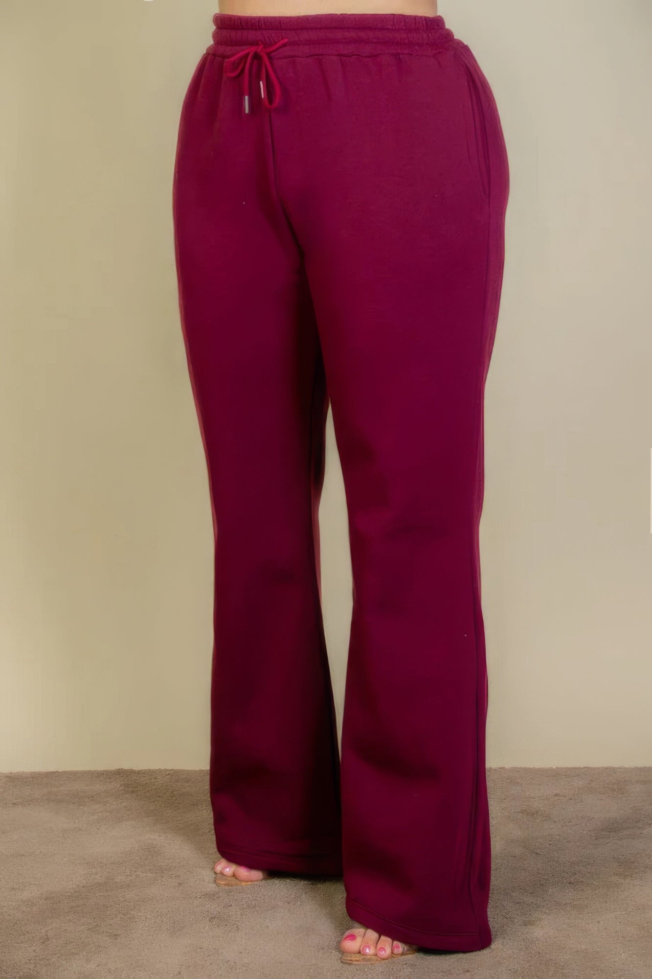 Pantalones deportivos con bolsillos inclinados y cintura con cordón ajustable de talla grande