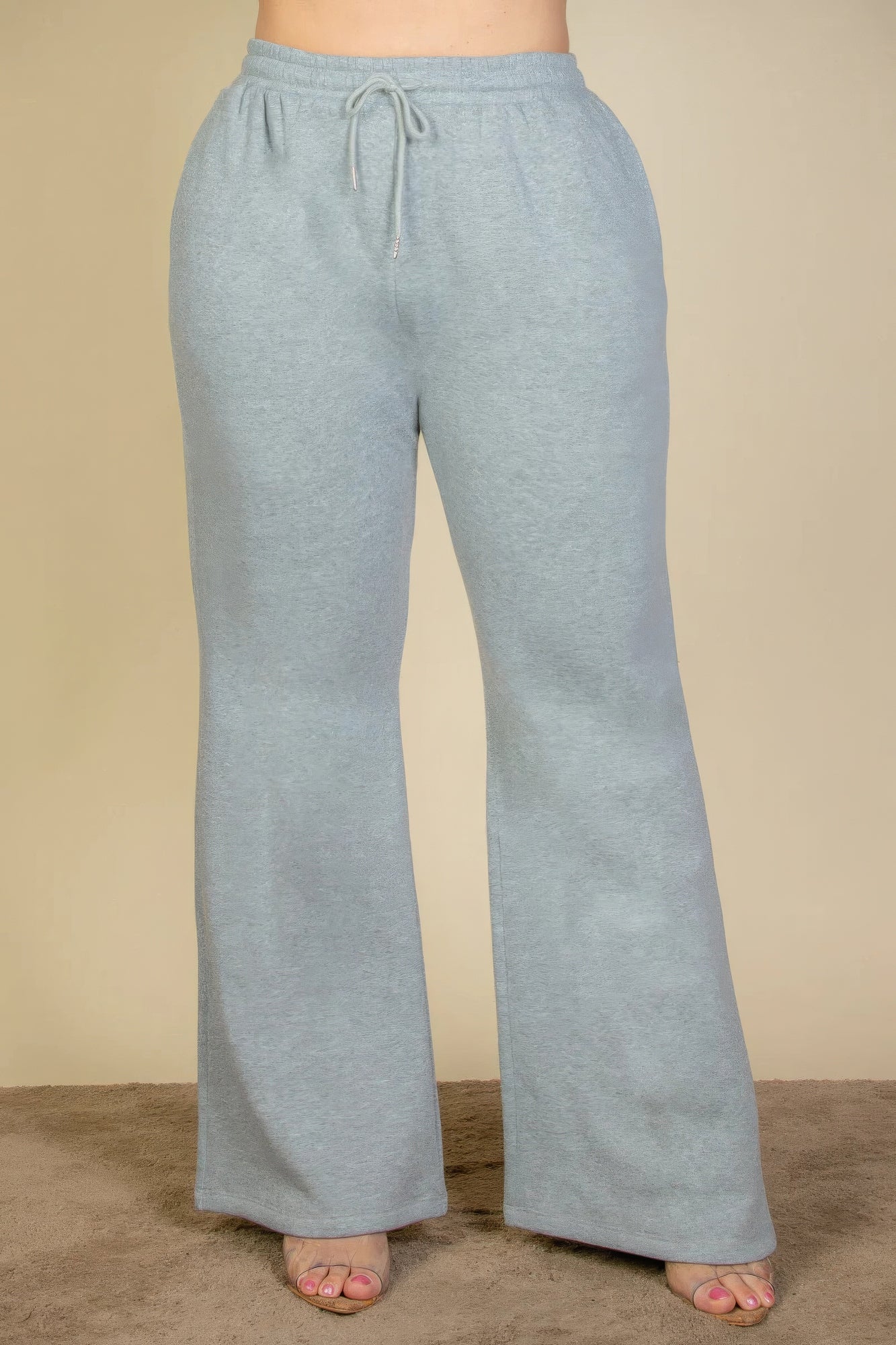 Pantalones deportivos con bolsillos inclinados y cintura con cordón ajustable de talla grande