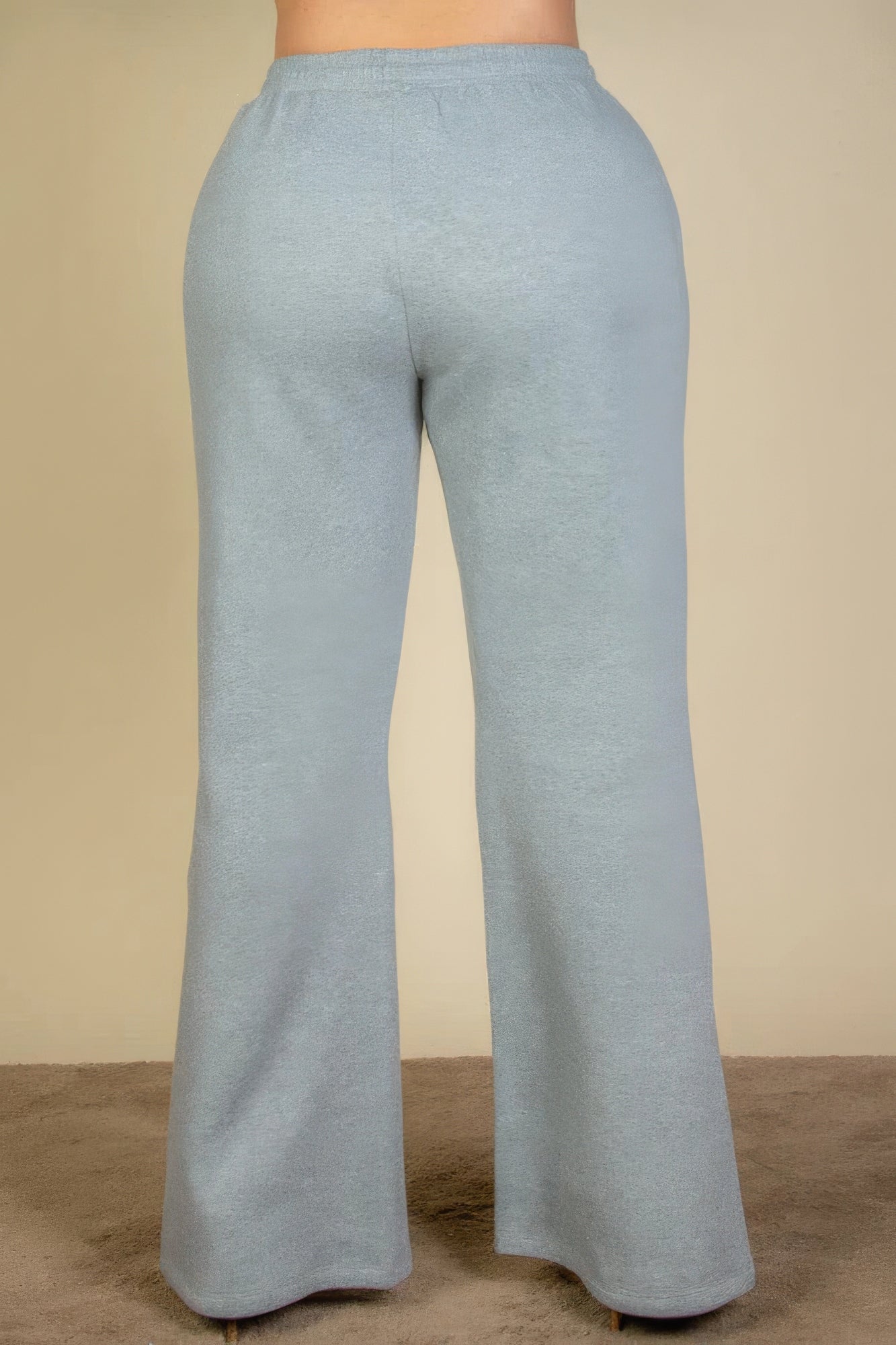 Pantalones deportivos con bolsillos inclinados y cintura con cordón ajustable de talla grande