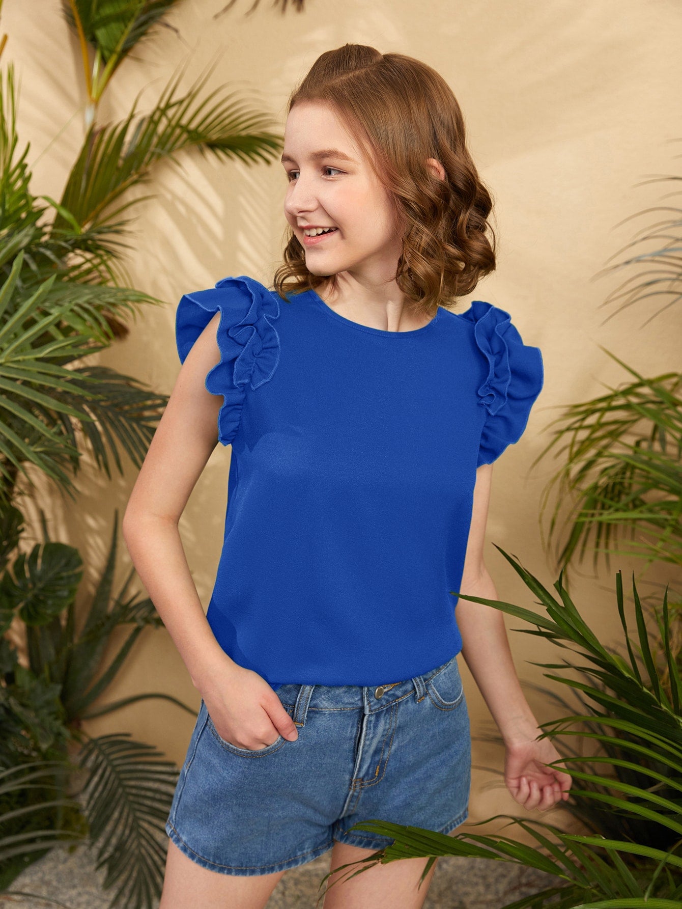 Blusa con mangas con volantes