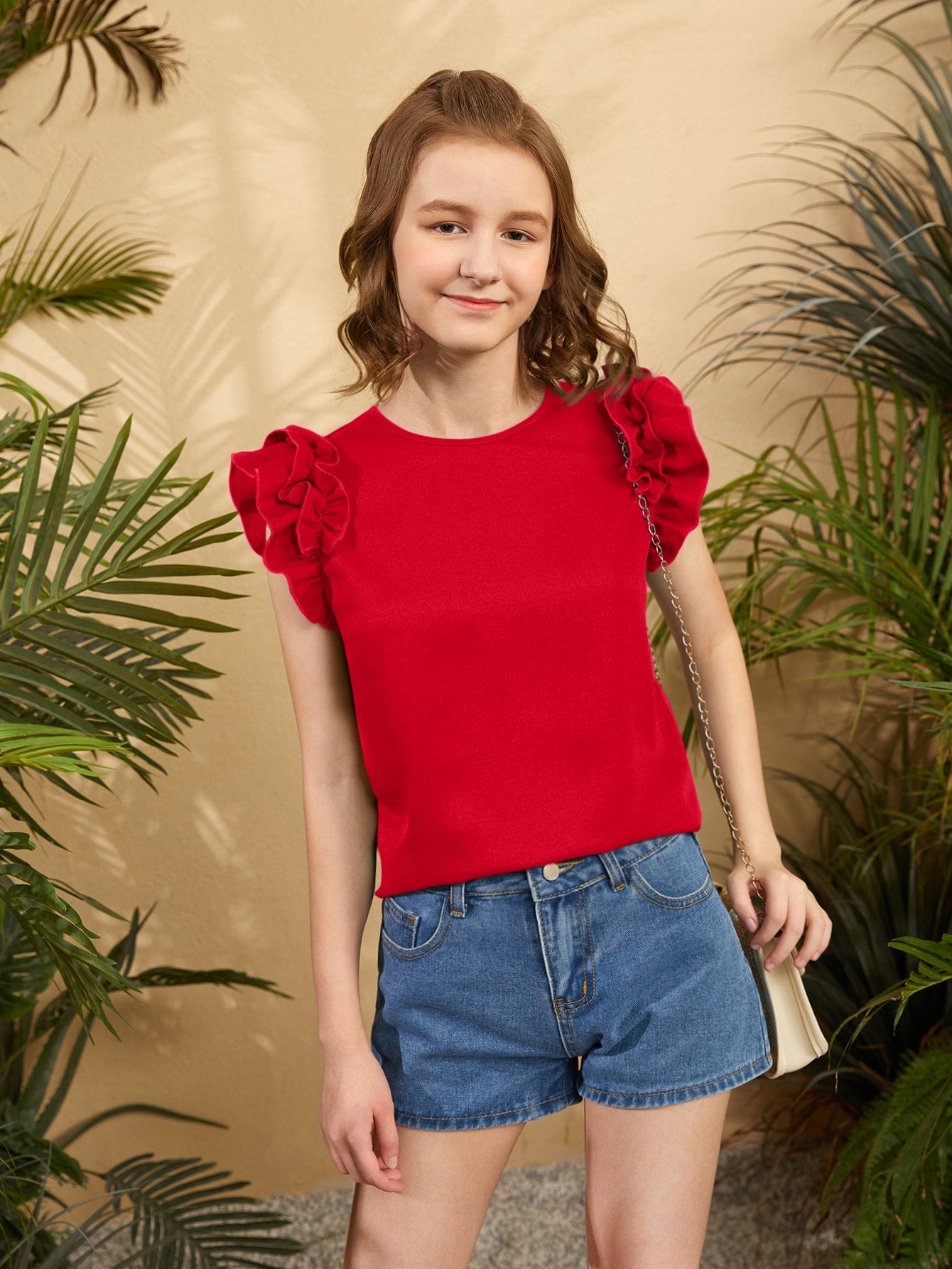 Blusa con mangas con volantes