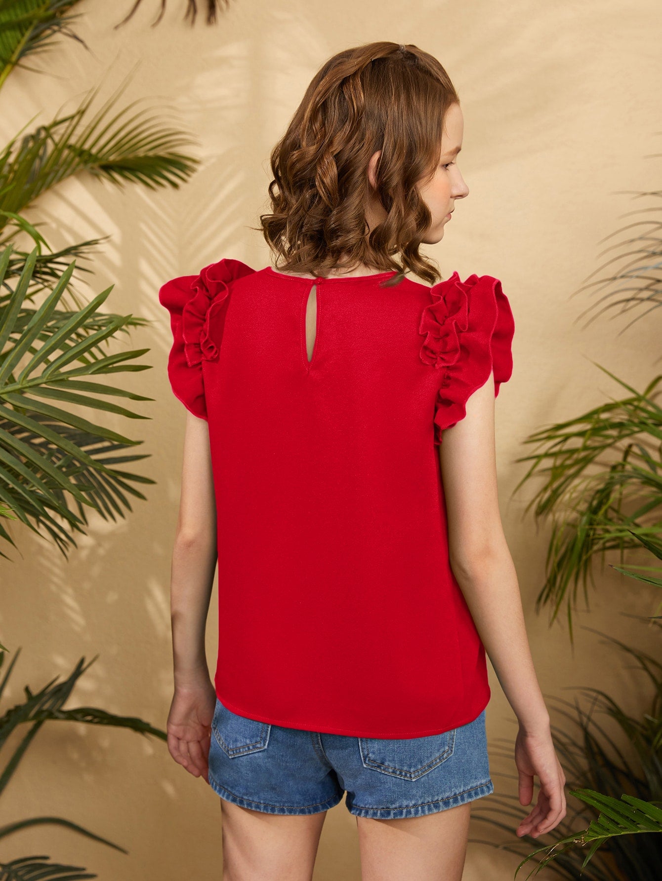 Blusa con mangas con volantes