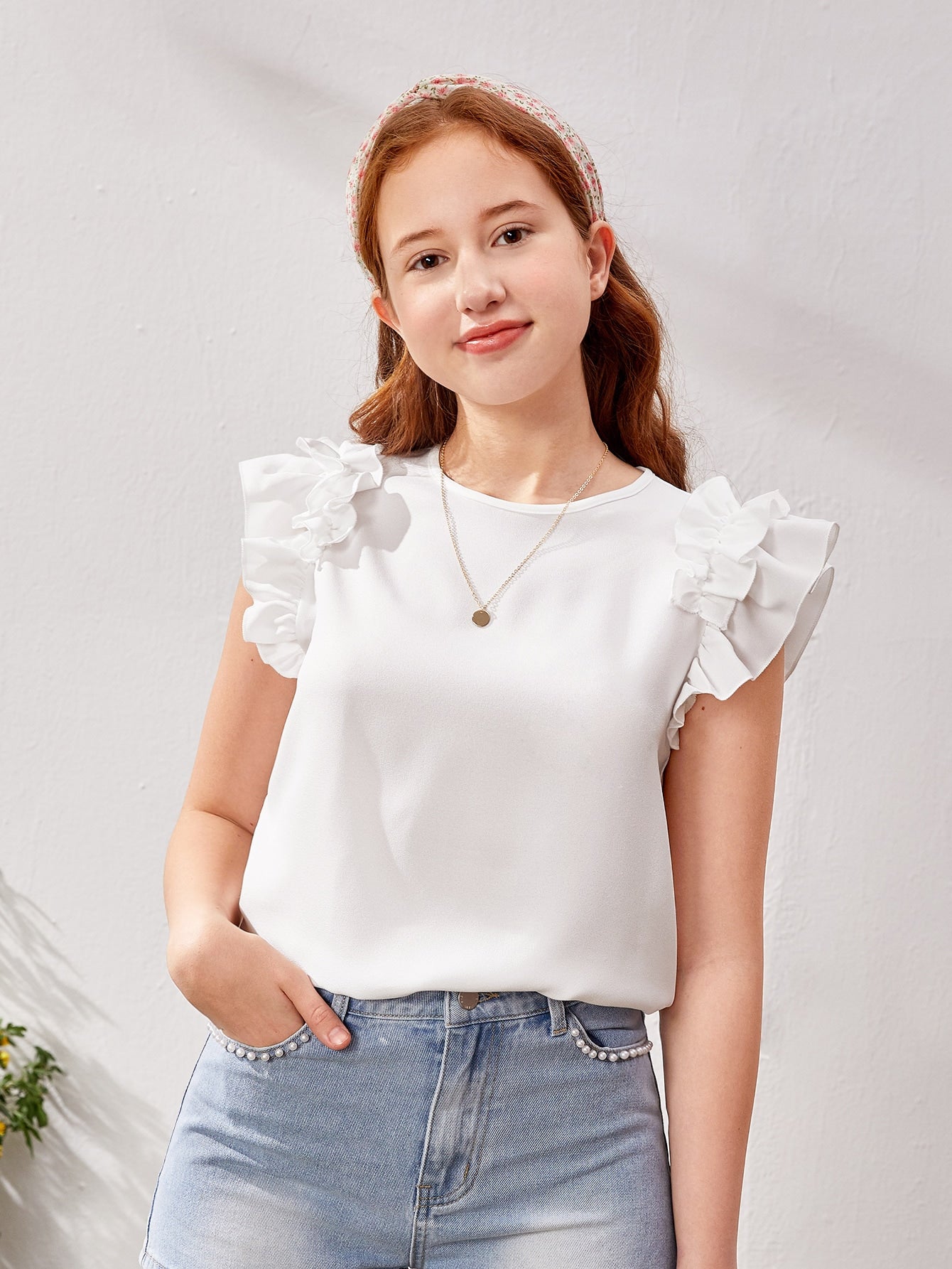 Blusa con mangas con volantes