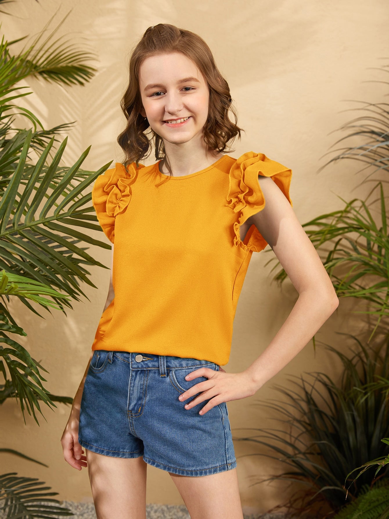 Blusa con mangas con volantes