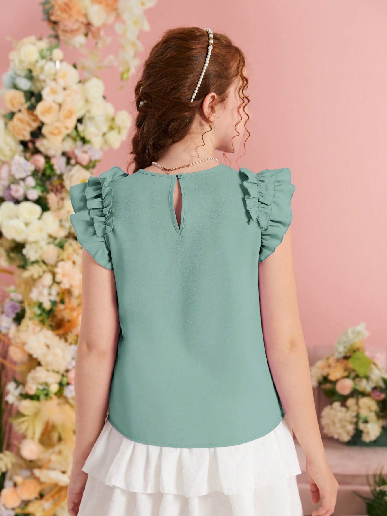 Blusa con mangas con volantes